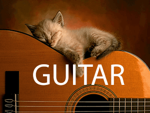 lær at spille guitar